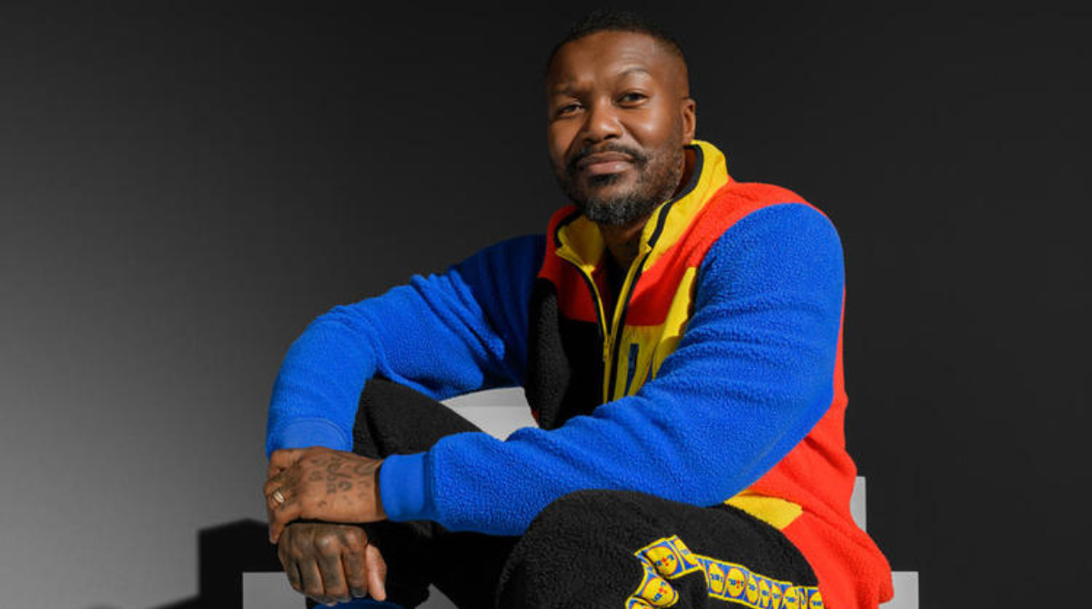 Djibril Cissé full habillé Lidl 